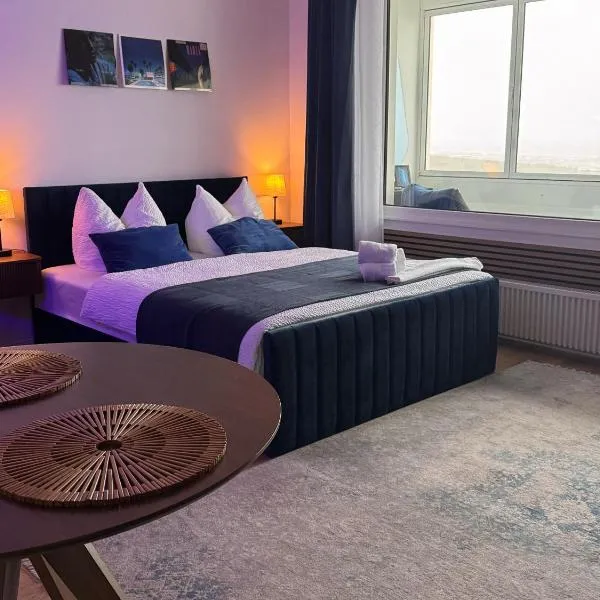 CuxHeaven - modernes Studio-Apartment direkt am Meer mit Pool, Sauna und Massage, hotel i Cuxhaven