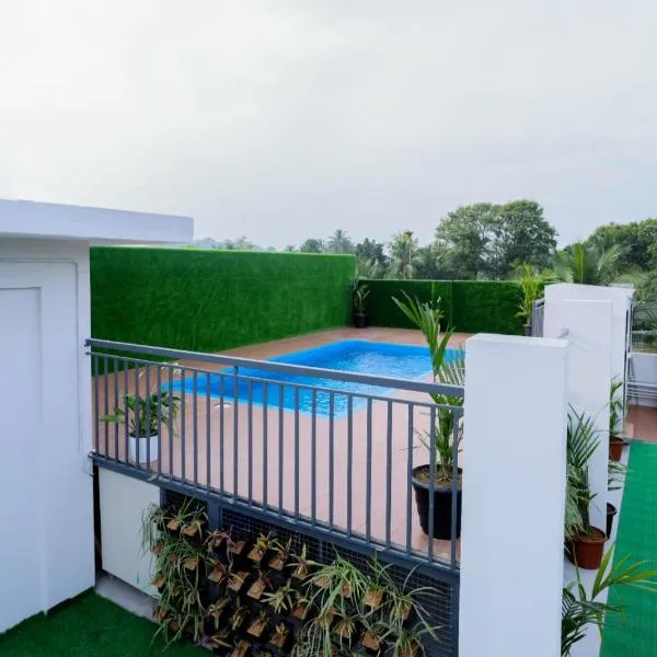 Viesnīca Munderi Green Mounts - Family Rooms with Swimming Pool pilsētā Kalpeta