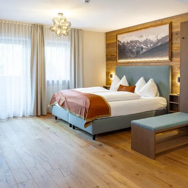 GRETI - Alpine Boutique Hotel mit Alpentherme Eintritt, reichhaltigem Frühstück, Sauna، فندق في باد هوفغاستين