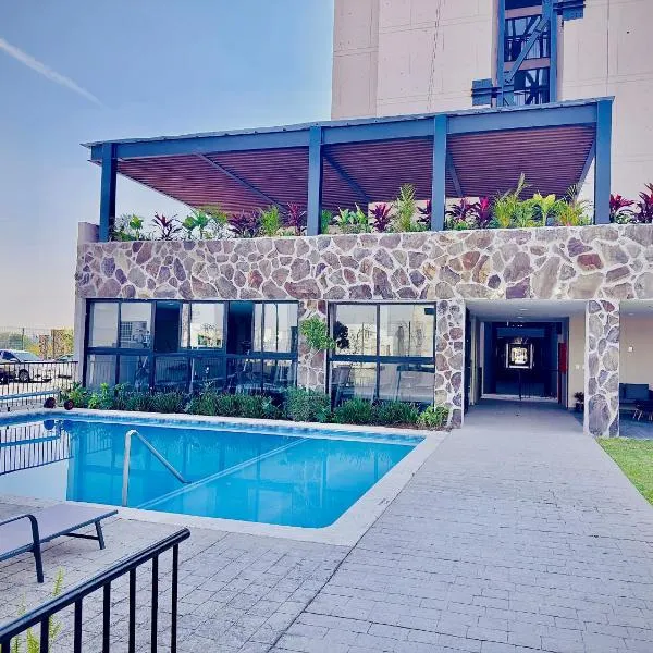 Departamento moderno con alberca, terraza y acceso controlado, hotel a Guadalajara