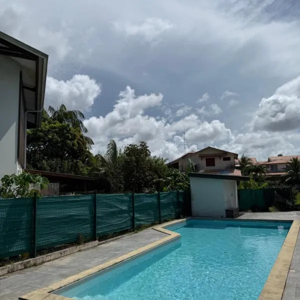 Appartement Montabo Zen T2 - Jacuzzi - Jardin - Terasse - Wifi - Clim - Zac hibiscus, hotel din Cayenne