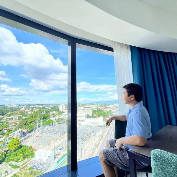 Minimalist 1BR Condo with NETFLIX at AEON TOWERS near Abreeza Mall by Rico，達沃市的飯店