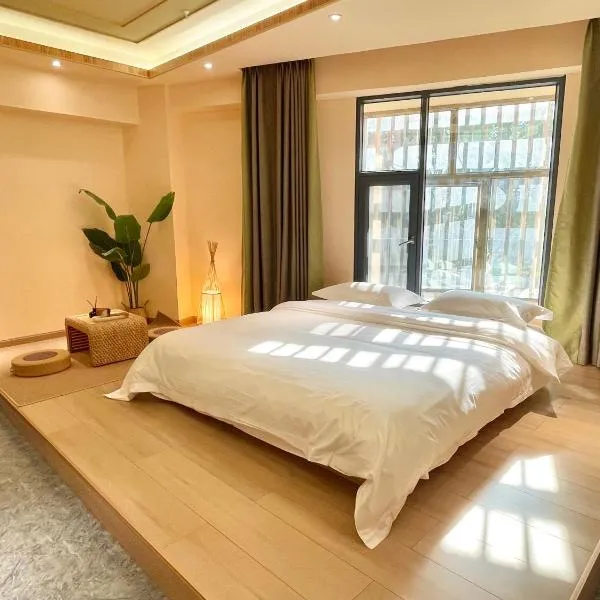 Mangshi Dai Elephant Mansion Hotel, hotel em Mangshi