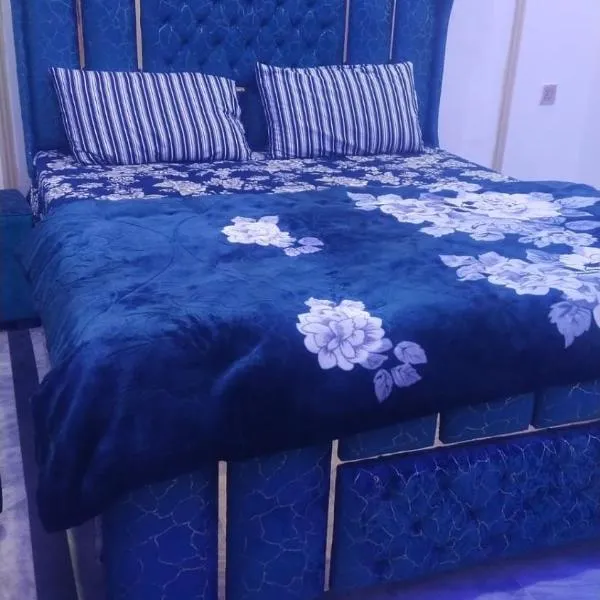 The 104-H, hótel í Faisalabad