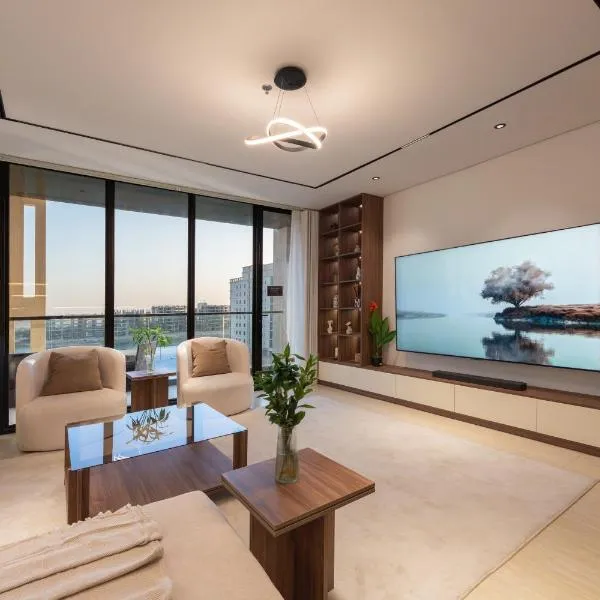 إطلالة بحرية مع بلكونة شاشة سينما 98 إنش 4 غرف，阿可賀巴的飯店