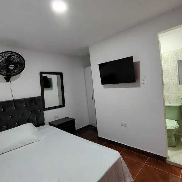 Habitaciones privadas con servicio de lavadora y cocina, hotel i Neiva