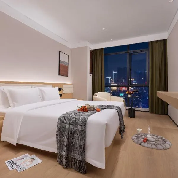 上饶鹿华摹尔酒店经济开发区吾悦广场店 More Hotel Shangrao Wuyue Plaza, hotell i Shangrao