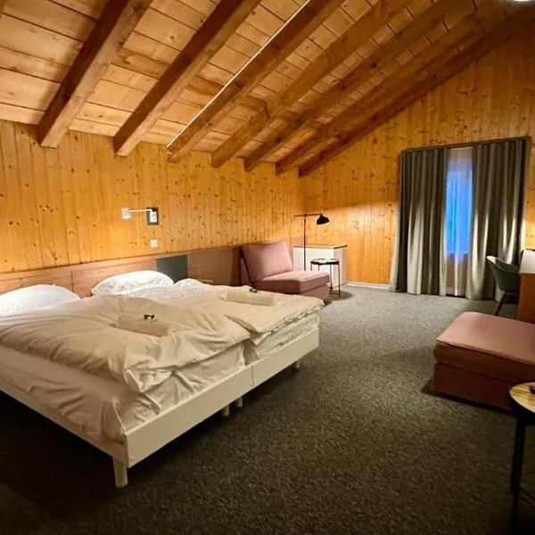 Hotel du Cheval Blanc, готель у місті Nods