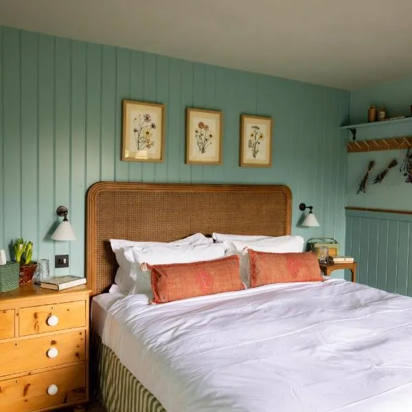 The Merry Harriers Pub, hotel en Hambledon
