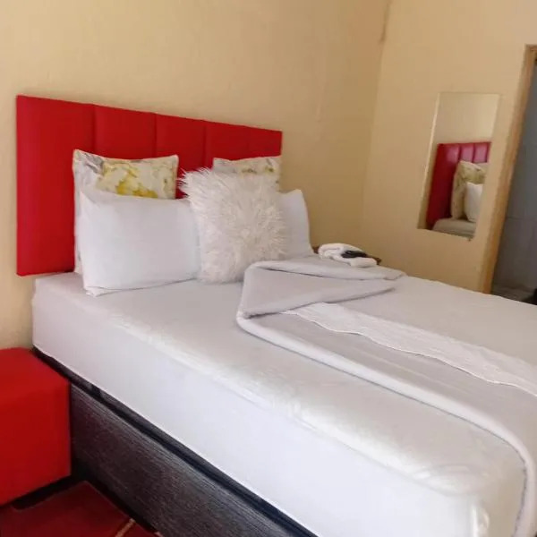 Happy Guest House, hótel í Mafikeng