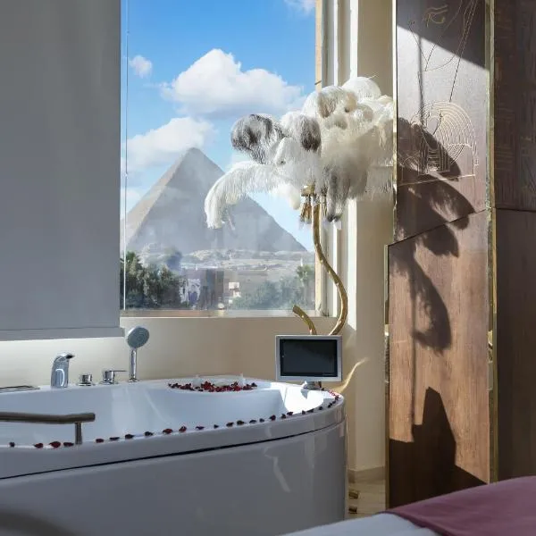 Pyramids Palace view inn With Rooftop Access & free airport pickup, готель у Каїрі