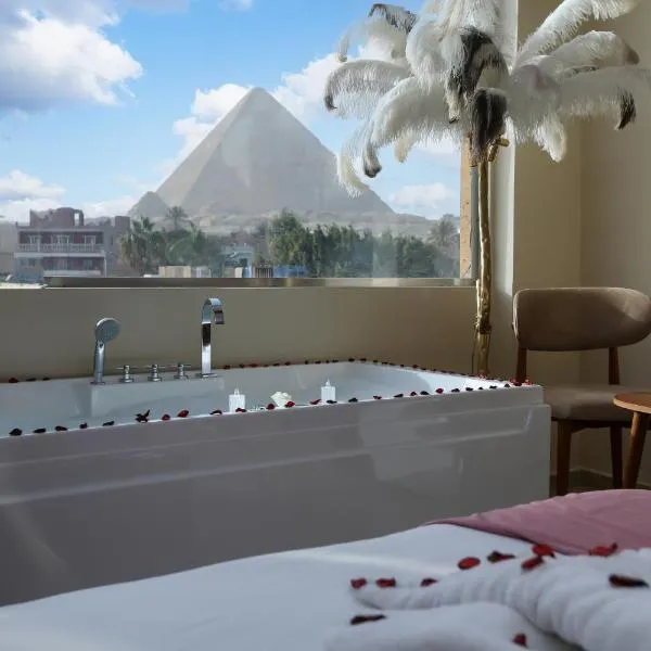 Pyramids Palace view inn With Rooftop Access & free airport pickup, hotell i Kairo