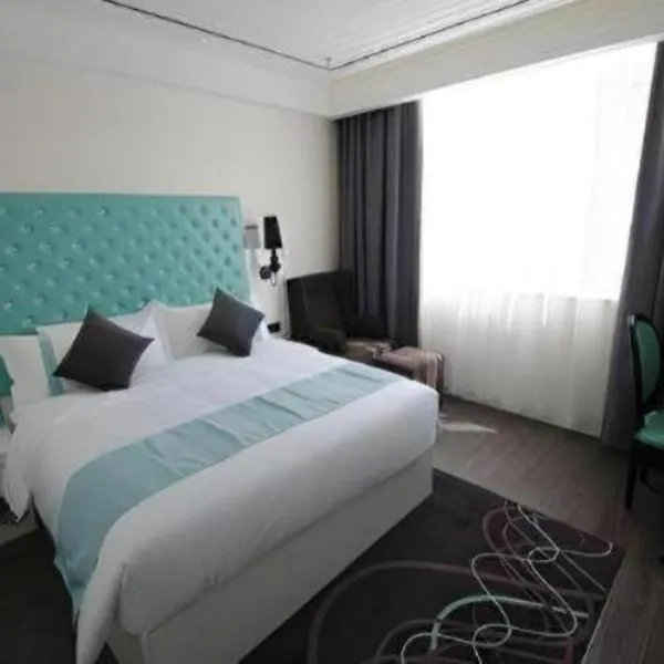 Xana Lite Korla Xiangli Avenue Food Street, хотел в Корла