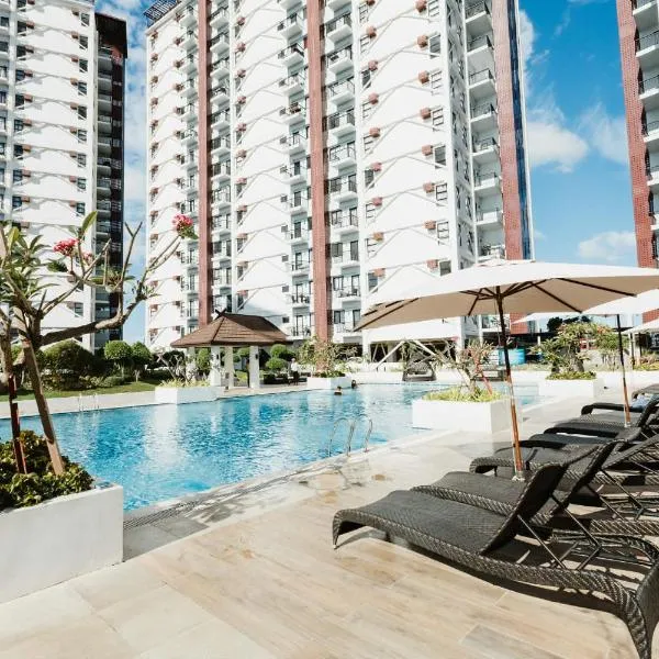 Resort-Style Condo, Near Airport, Pool, Fast WiFi, Netflix & Disney, Hotel in Mactan Island