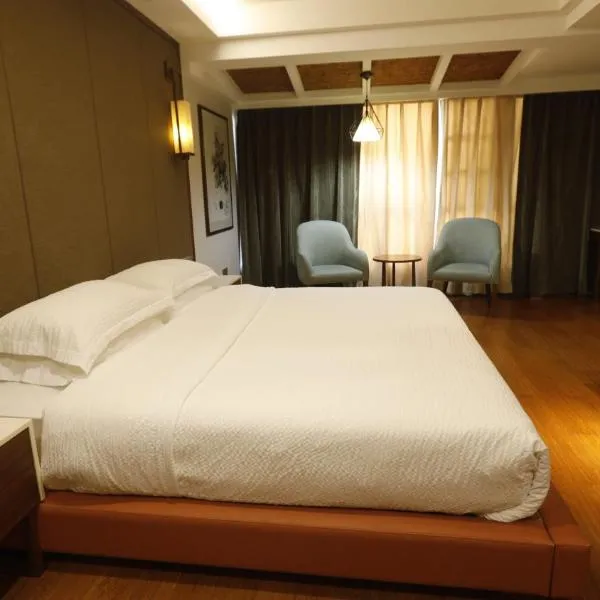 장자제에 위치한 호텔 Rosie Lodge Hotel