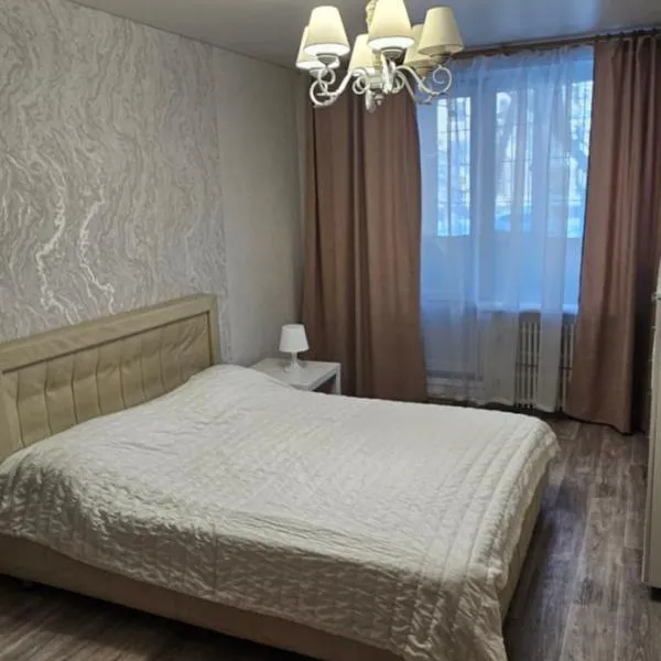 Квартира у метро Спортивная 1этаж, khách sạn ở Kharkov