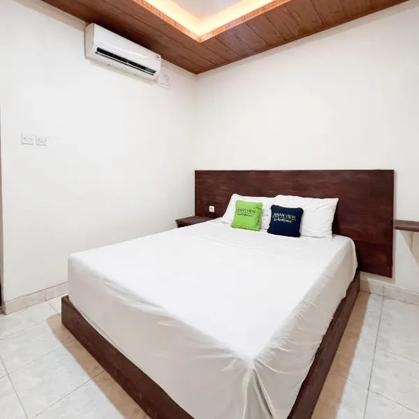 Urbanview Hotel Arta Guna Casa 2, хотел в Денпасар