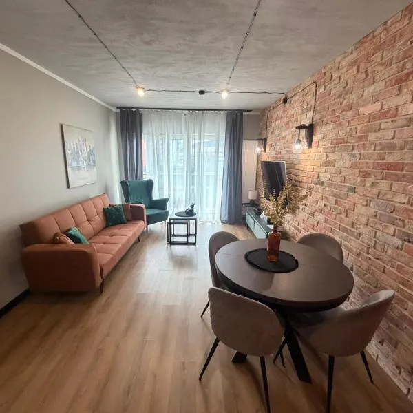 APARTAMENT z widokiem na stadion Styl Industrialny Jedyny taki CHECK IN 24 H、ポズナンのホテル