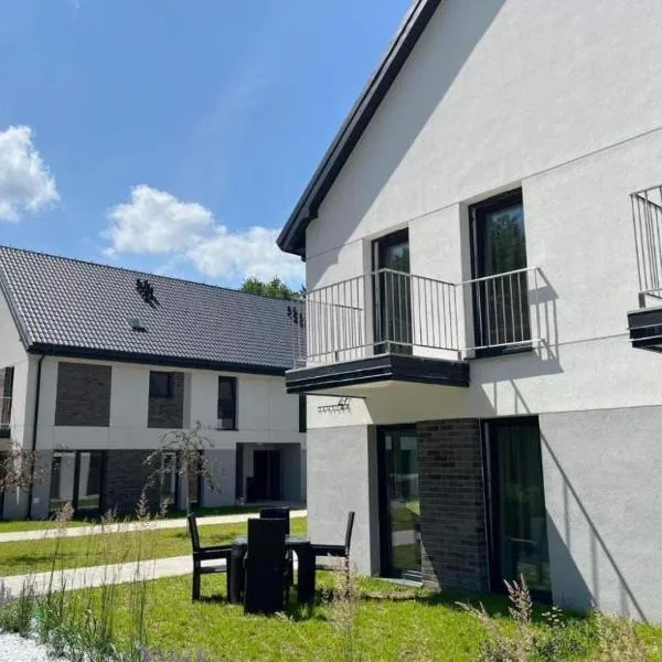 Sam Las Apartamenty Białowieża, מלון בביאלוביצה