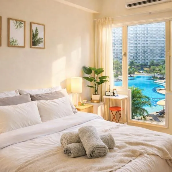633 Air Condo Pool View Escape Cozy 1BR w Sofa Bed, hotel em Manilla