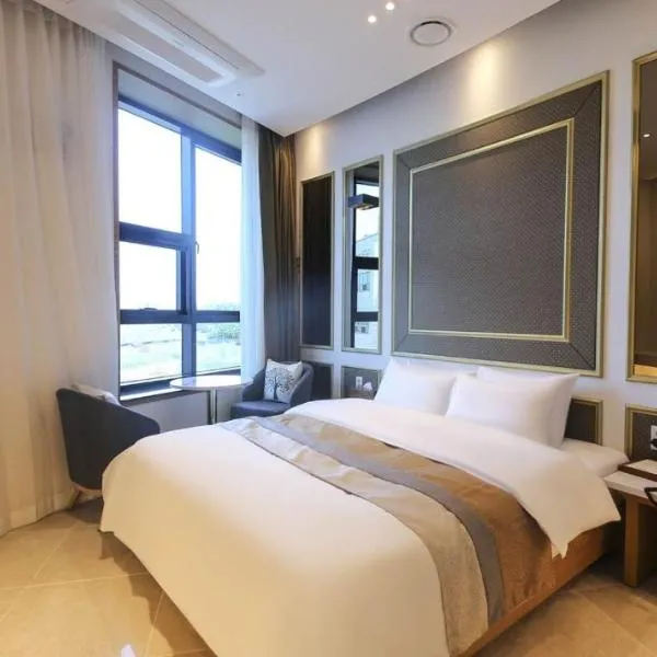 호텔뷰, hotell i Tomin-dong