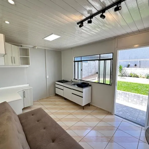 Kitnet aconchegante para 4 pessoas com carregador de carros elétricos, ξενοδοχείο σε Guarapuava