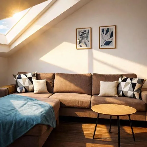 Moderne Ferienwohnung für Familien im Dachgeschoss, отель в городе Bosau