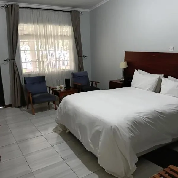 The Village Inn Hotel, Nyanga, hotel di Nyanga