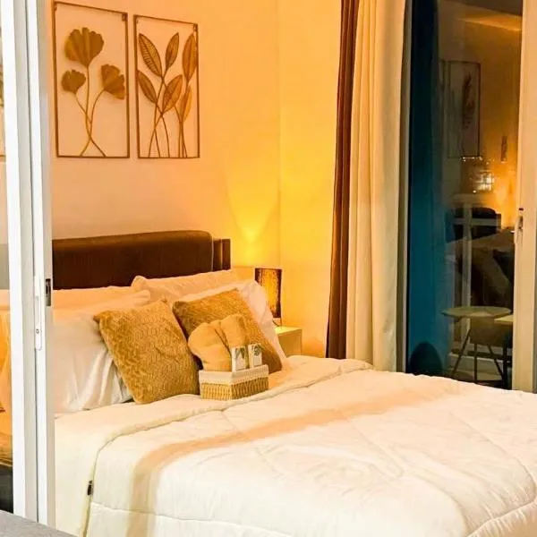 Condo Transient by Eugenio Tan, hôtel à Manille