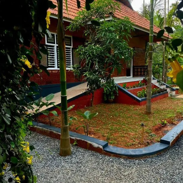 Mitra retreats โรงแรมในMānantoddy