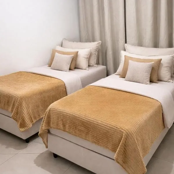 Lar Urbano II Apartment, hotel din Manhuaçu