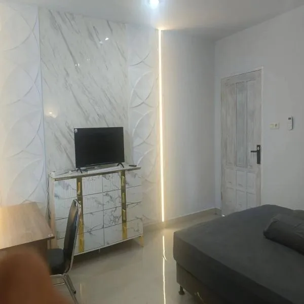 Cozzy Aryaputra Residence, hôtel à Gorontalo