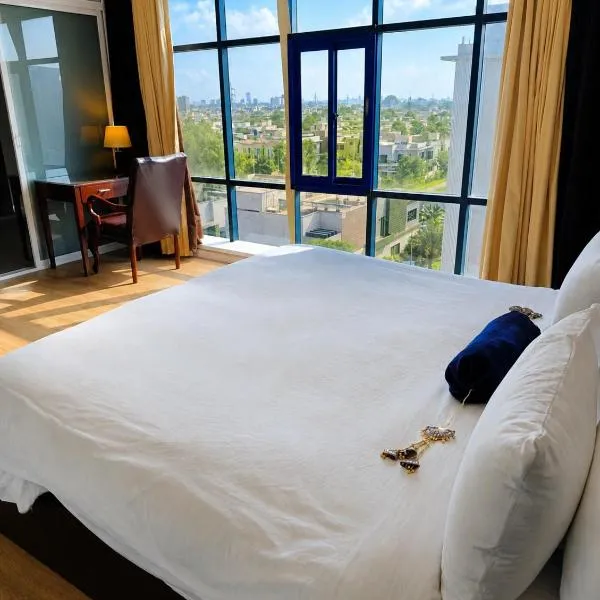 Taj Luxury Residences Apartments near Allama Iqbal International Airport, Hotel in Lahore