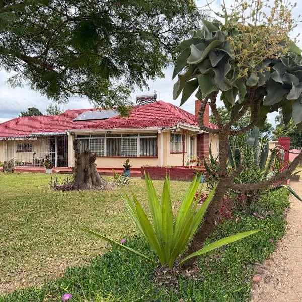 Room 5 mins from RG Mugabe Airport、ハラレのホテル