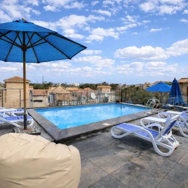 Zen Pyramids Luxury Villa, מלון בGhaţāţī