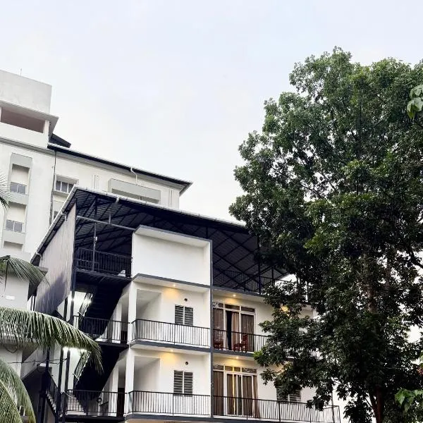 Orbis Rooms & Apartments, hotel di Kakkanad