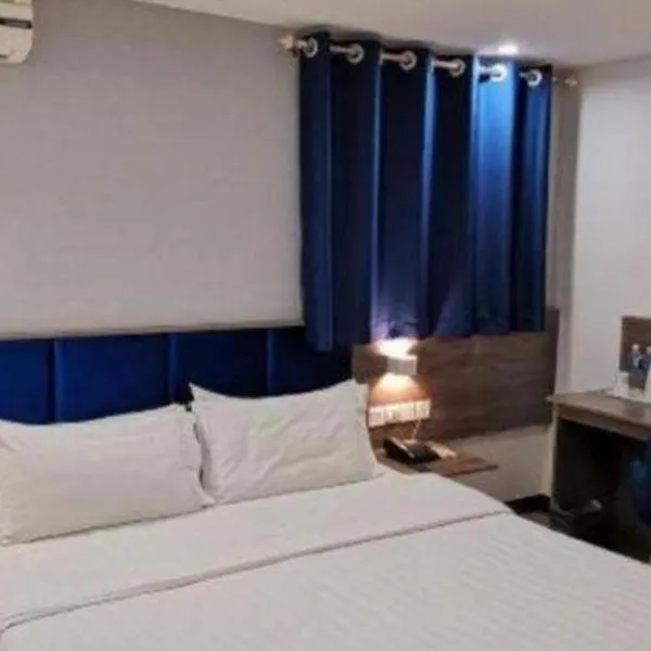 7 Days Inn Lvliang Bus Terminal, hotel en Luliang