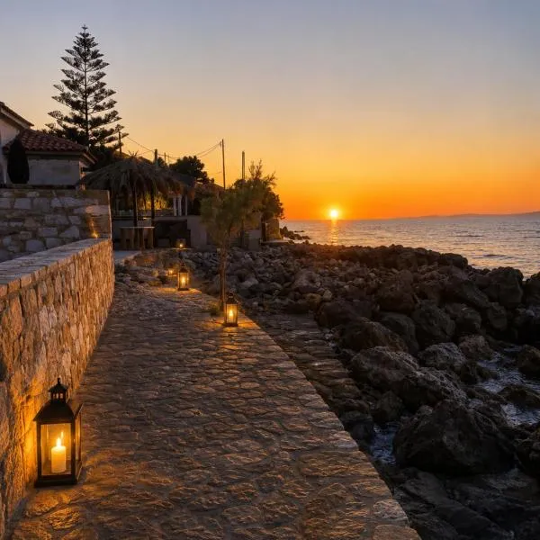 Villa Harmonia II-Seafront Retreat โรงแรมในLivadáki