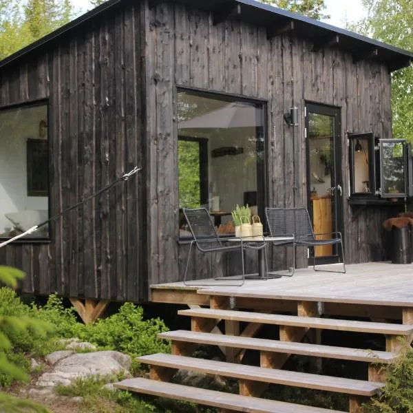 Forest cabin with stunning mountain view & Sauna，圖什比的飯店