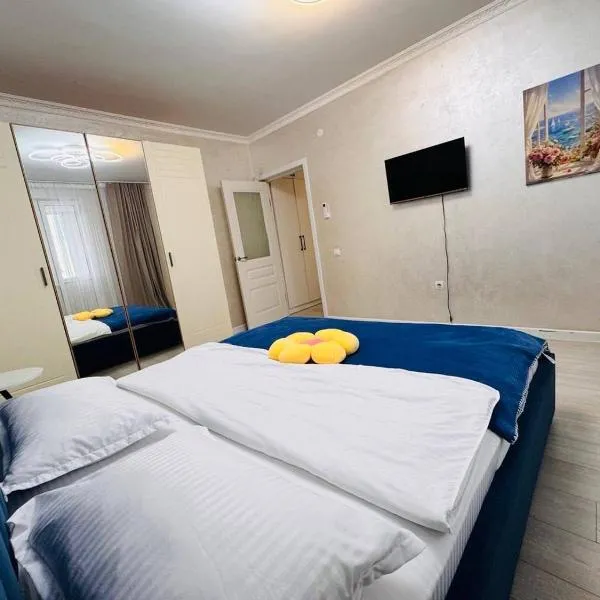 ЖК АЛМАЛЫ Комфортная однушка напротив Алматы Арена, hotel in Alma-Ata