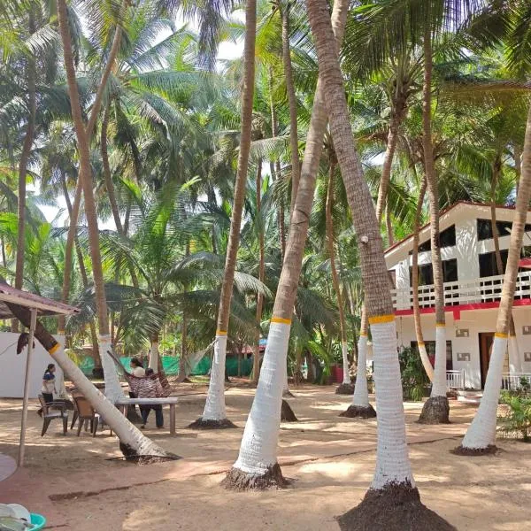 Samant Beach Resort, hotel en Malvan