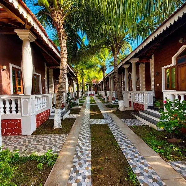Baga Beach Palm Cottage, hotel i Calangute