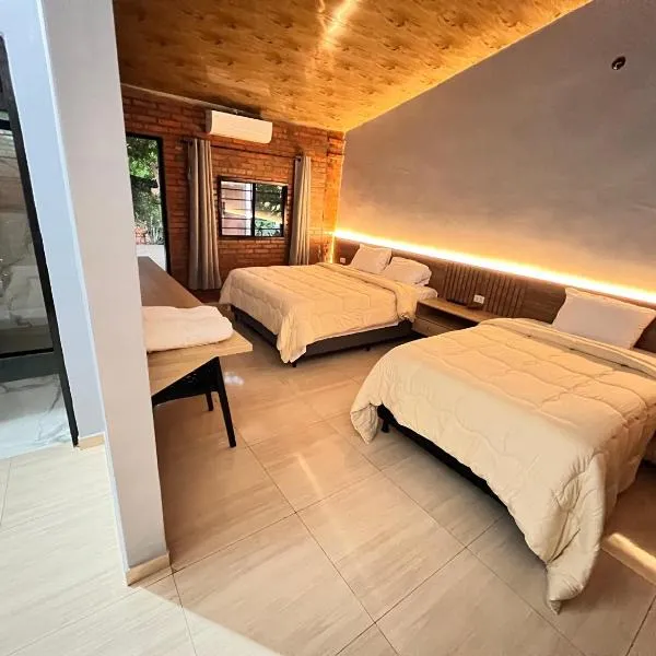 Hotel Suites Bambú, hotel em Minga Guazú