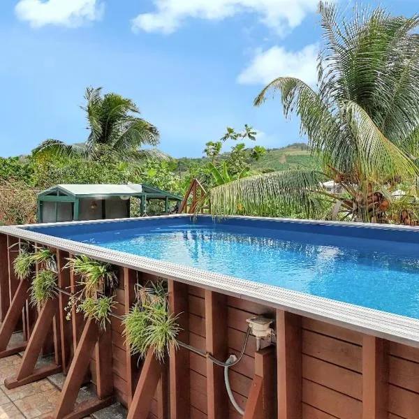 Appartement confortable à Le François avec piscine partagée, hotel in Le François