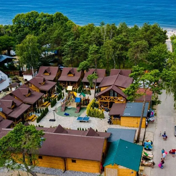 Domy z Bala przy plaży- Domki klimatyzowane - JACUZZI, SAUNA, lody, popcorn, ryba wedzona i ognisko gratis-od maja!, hotel di Dziwnowek