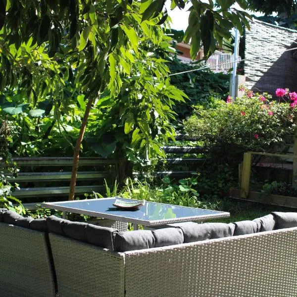 Case Orchidée Maison avec jardin à Petite-Île, hôtel à Petite Île