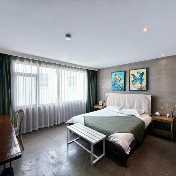 Suzhou Unique Space Design Art Hotel: Suzhou şehrinde bir otel
