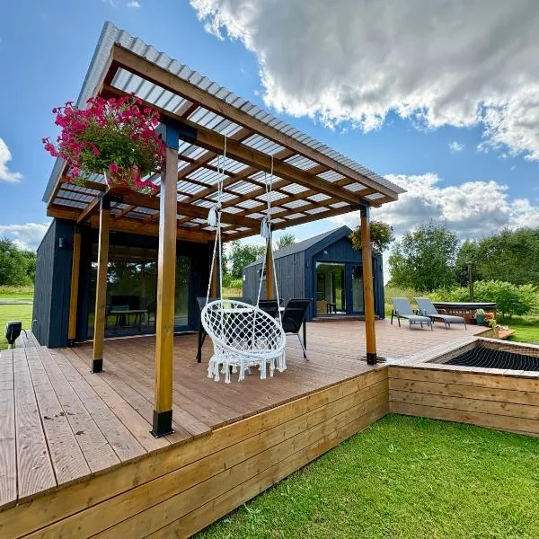Rātes Krasti - Rasa - holiday house with sauna and lakeview, hotel u gradu 'Lejasciems'