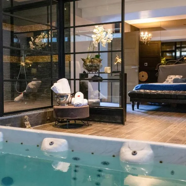 Suites Wellness à Sprimont - Logements avec jacuzzi pour 2 personnes, hotel di Sprimont