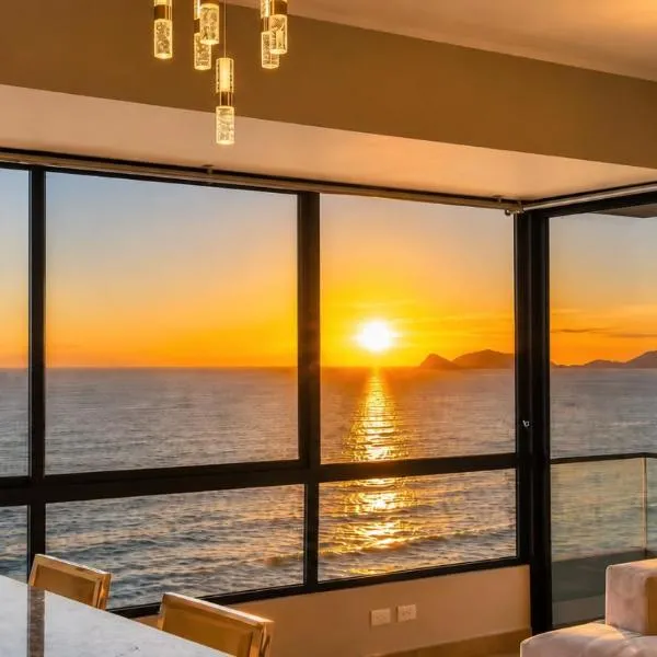 Oceanfront 3BR Apartment 15 Minutes to the Airport, Fast WiFi, Pool, Gym, Sauna and Free Parking, hotel u Limi